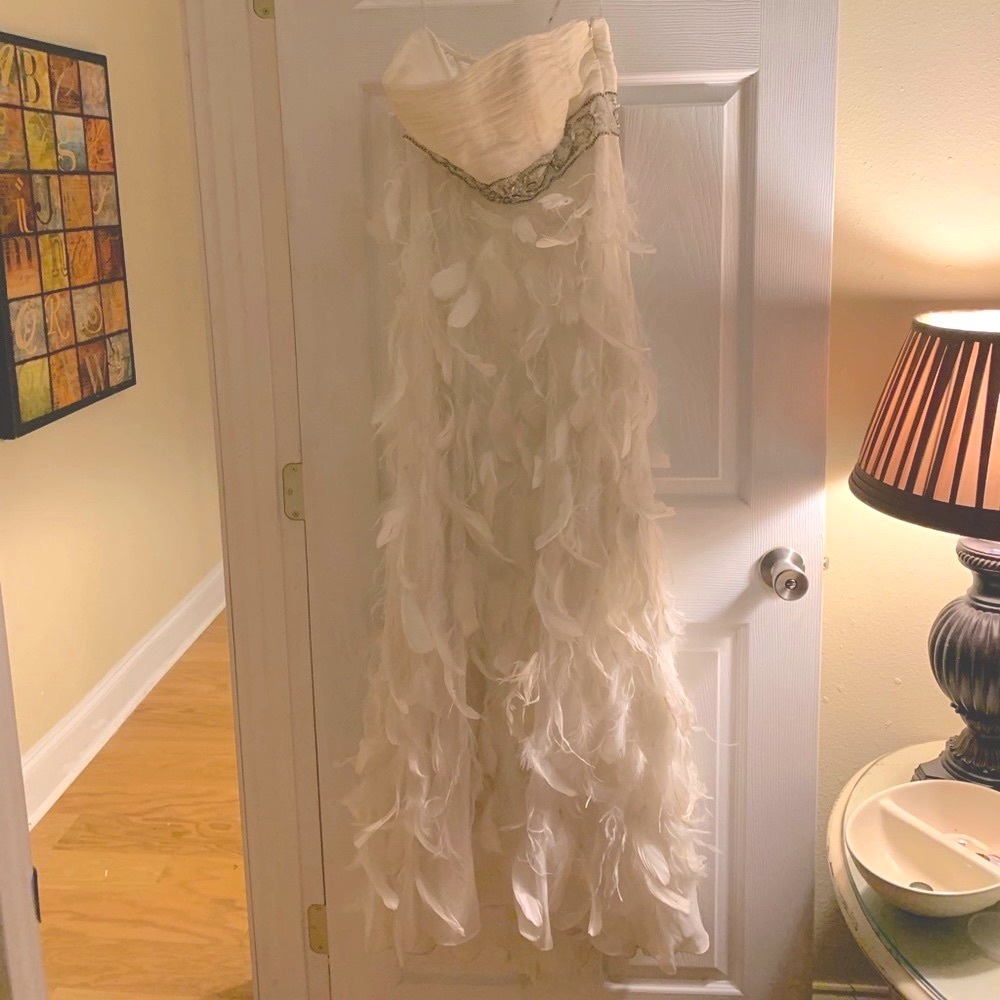 Beautiful white strapless feather gown